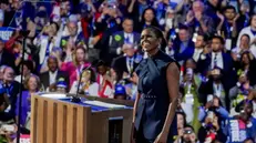 epa11557361 Former First Lady of the US Michelle Obama speaks on the second night of the Democratic National Convention (DNC) at the United Center in Chicago, Illinois, USA, 20 August 2024. The 2024 Democratic National Convention is being held 19 to 22 August 2024 in which delegates of the United States' Democratic Party will vote on the party's platform and ceremonially vote for the party's nominees for president and vice president, Vice President Kamala Harris and Governor Tim Walz of Minnesota, for the upcoming presidential election. EPA/WILL OLIVER