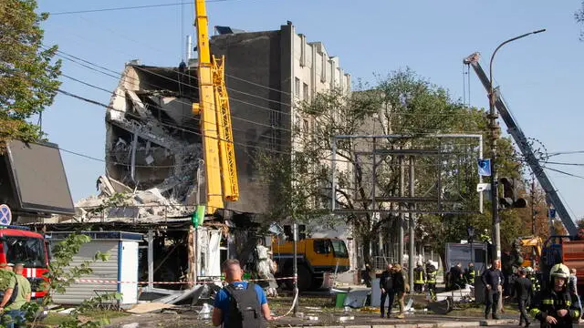 epa10873863 Rescuers work at the site of a missile strike on a hotel building in Cherkasy, central Ukraine, 21 September 2023, amid the Russian invasion. Ukraine recorded 43 rocket attacks overnight, 36 of which were shot down, the Ukrainian Air Force said. A hotel building was destroyed in Cherkasy as a result of the missile attack. A fire broke out in the building and a market. At least seven people were injured and 10 others were evacuated. One person was rescued from the rubble, Ihor Klymenko, Ukraine's Minister of Internal Affairs wrote on telegram. EPA/IGOR TKACHENKO