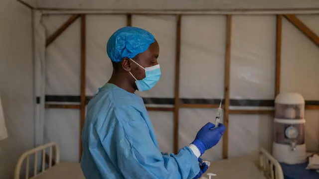 epa11551532 A member of staff prepares an injection at the Munigi Health Centre in Munigi, Democratic Republic of Congo on August 16, 2024. The European Centre for Disease Prevention and Control (ECDC) warned that Europe is likely to see more imported cases due to the virusâ€™s spread in several African nations after the World Health Organization declared the spread of mpox in Africa as a global health emergency. Mpox belongs to the same family of viruses as smallpox but causes milder symptoms like fever, chills and body aches. EPA/MOISE KASEREKA