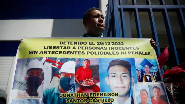 epa11491932 A family member of a young man detained under the state of emergency displays a banner outside the headquarters of the Attorney General's Office in Antiguo Cuscatlan, El Salvador, 22 July 2024. Lawyers from the civil organization Socorro Juridico Humanitario (SJH) accused Minister of Security Gustavo Villatoro and Director of Penitentiary Centers Osiris Luna before the Attorney General's Office on 22 July 2024 for crimes against humanity allegedly committed under the state of emergency, which has been in effect in El Salvador since March 2022 to combat gangs. EPA/Rodrigo Sura