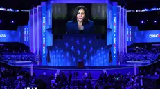 epa11560514 Democratic presidential candidate Kamala Harris is seen on a monitor ahead of the final night of the Democratic National Convention (DNC) at the United Center in Chicago, Illinois, USA, 22 August 2024. The 2024 Democratic National Convention is being held 19 to 22 August 2024 in which delegates of the United States' Democratic Party approved the party's platform and ceremonially voted for the party's nominees for president and vice president, Vice President Kamala Harris and Governor Tim Walz of Minnesota, for the upcoming presidential election. EPA/MICHAEL REYNOLDS