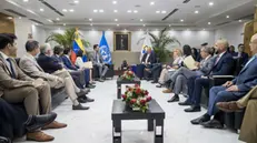 epa11296385 President of the National Electoral Council, Elvis Amoroso (C-R) meets with the Electoral affairs officer and boss of the delegation of the UN, Jorge Alberto Grayeb Munayer (C-L) during an encounter in Caracas, Venezuela, 23 April 2024. The UN committee will hold different reunions with representatives members of the public power and different politics associations. EPA/Miguel Gutierrez