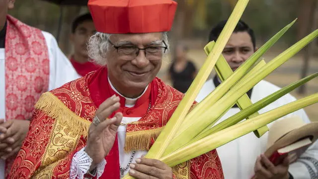 epa11241672 Cardinal Leopoldo Brenes officiates the Palm Sunday mass, at the beginning of the religious festivities of Holy Week, in Managua, Nicaragua, 24 March 2024. The Catholic Church of Nicaragua began the celebrations of Holy Week this 24 March and for the second consecutive year without processions in the streets, after the prohibition by the Government of Daniel Ortega. This Palm Sunday, the archdiocese of Managua held the traditional 'Triumph Procession' with the image of Jesus Christ, also known as 'Las Palmas', with which Holy Week was officially inaugurated, on the side of the Managua Metropolitan Cathedral, according to EFE. EPA/Jorge Torres