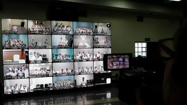 epa11137804 Monitors shows gang members during a simultaneous virtual hearing in different prisons at the Isidro Menendez judicial center, in San Salvador, El Salvador, 08 February 2024. A court in El Salvador held one of the first virtual hearings against 492 leaders of the Mara Salvatrucha (MS13) gang, including historical leaders, for more than 37,000 crimes, in the midst of the 'war against gangs' of the Salvadoran Government. EPA/RODRIGO SURA