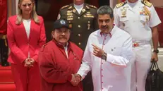 epa11298561 The president of Venezuela Nicolas Maduro (R) receives the president of Nicaragua, Daniel Ortega, who will participate in the ALBA Summit at the Miraflores Palace, in Caracas, Venezuela, 24 April 2024. The XXIII Summit of the Bolivarian Alliance for the Peoples of Our America (ALBA) brings together in Caracas presidents of several bloc countries, among them, the Cuban Miguel Diaz-Canel, the Nicaraguan Daniel Ortega, and the Bolivian Luis Arce, who will meet with their Venezuelan counterpart Nicolas Maduro in a conclave in which they will address issues of common interest. EPA/Miguel Gutierrez