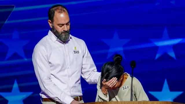 epa11558730 Jon Polin and Rachel Goldberg, parents of Hammas hostage Hersh Goldberg-Polin, deliver remarks during the third night of the Democratic National Convention (DNC) at the United Center in Chicago, Illinois, USA, 21 August 2024. The 2024 Democratic National Convention is being held from 19 to 22 August 2024, during which delegates of the United States' Democratic Party will vote on the party's platform and ceremonially vote for the party's nominee for president, Vice President Kamala Harris, and for vice president, Governor Tim Walz of Minnesota, for the upcoming presidential election. EPA/WILL OLIVER