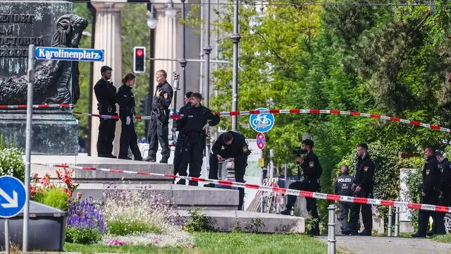 epa11586464 Police officers secure the area after a shooting near the NS Documentation Center for the History of National Socialism building in Munich, Germany, 05 September 2024. German police officers on 05 September shot a man who was firing a firearm near the Israeli Consulate General and the Nazi Documentation Center in Munich. According to the police, there is no evidence of any other suspects. EPA/ANNA SZILAGYI