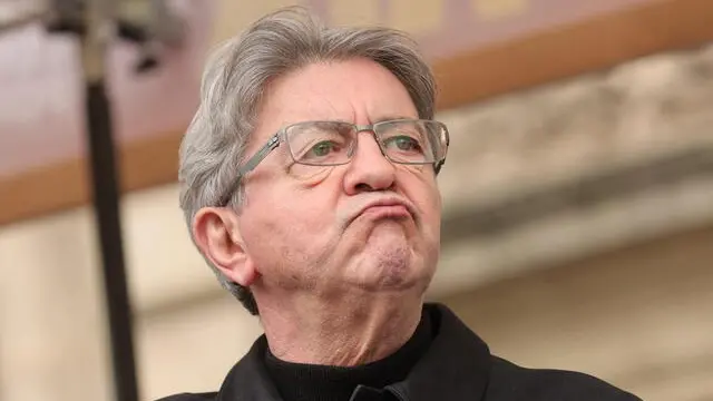 epa11312327 French left-wing La France Insoumise (LFI) party leader Jean-Luc Melenchon delivers a speech during the annual May Day march in Paris, France, 01 May 2024. Unions in France are demanding improved living conditions, higher wages, the defense of public services and a just and lasting peace. EPA/Teresa Suarez