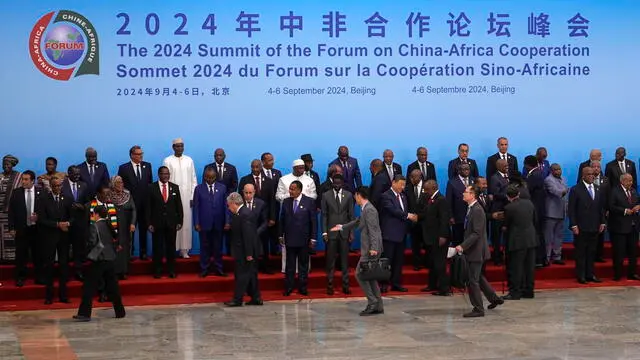 epa11585728 China's President Xi Jinping (C-R) shakes hands with leaders from African countries as they arrive for a group photo session before the opening ceremony of the China Africa Forum at the Great Hall of the People in Beijing, China, 05 September 2024. EPA/Andy Wong / POOL