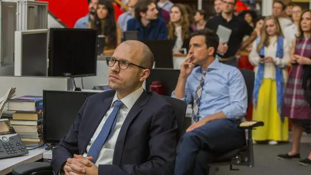 epa05902775 A handout photo made available on 11 April 2017 by the New York Times News Service shows A.G. Sulzberger, (L), deputy publisher, and Sam Dolnick, assistant editor, during a gathering in The New York Times newsroom for the announcement of the 2017 Pulitzer Prizes, in New York, USA, 10 April 2017. The Times won three awards for breaking news photography, feature writing and international reporting. EPA/HIROKO MASUIKE / NYTNS / HANDOUT FOR USE ONLY WITH STORIES ON THE 2017 PULITZER PRIZES - MAGS OUT HANDOUT EDITORIAL USE ONLY/NO SALES/NO ARCHIVES