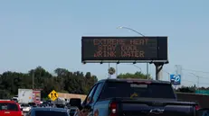 epa11456090 Signs warn people of extreme heat in Los Angeles, California, USA, 03 July 2024. More than 70 percent of California is under an excessive-heat warning, issued by the National Weather Service. In Southern California, these heat warnings are in effect through Monday night for parts of the Antelope, Apple, Lucerne and Coachella valleys, with temperatures reaching triple-digits, over 100 Fahrenheit (approximately 38 degrees Celsius). EPA/CAROLINE BREHMAN