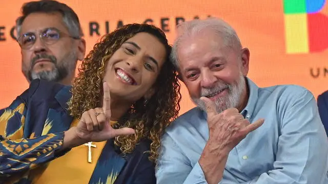 epa11234087 Brazil's President Luiz Inacio Lula da Silva (R) and Minister of Racial Equality, Anielle Franco (L) pose during the launching ceremony of the Living Black Youth Plan (public policy package for black youth), in the administrative region of Ceilandia, outskirts of Brasilia, Brazil, 21 March 2024. Brazilian President Lula presented a plan to support black youth with a strong speech against racism, which he described as a "scourge" that must be fought in the country and in the world. EPA/Andre Borges