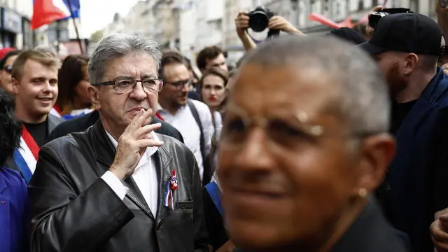 epa11591147 Leader of the left-wing party La France Insoumise (LFI) Jean-Luc Melenchon (L) attends a protest rally in Paris, France, 07 September 2024 as the French left parties called for rallies against President Macron's politics. Protests are taking place across France over the appointment of Michel Barnier as the new French prime minister, after the election that resulted in a National Assembly without a majority and in which the left won the largest number of seats. EPA/YOAN VALAT