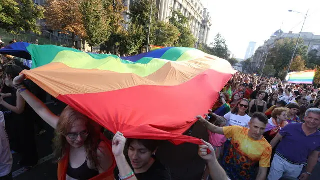 epa11591821 Participants wave a giant rainbow colored flag during the Belgrade Pride Parade march in Belgrade, Serbia, 07 September 2024. Holding rainbow colored flags, balloons and banners participants marched through the main streets of Serbia's capital near the main institutions in the city to which Belgrade Pride has been addressing its demands for improved rights for the LGBTQ+ community. EPA/ANDREJ CUKIC