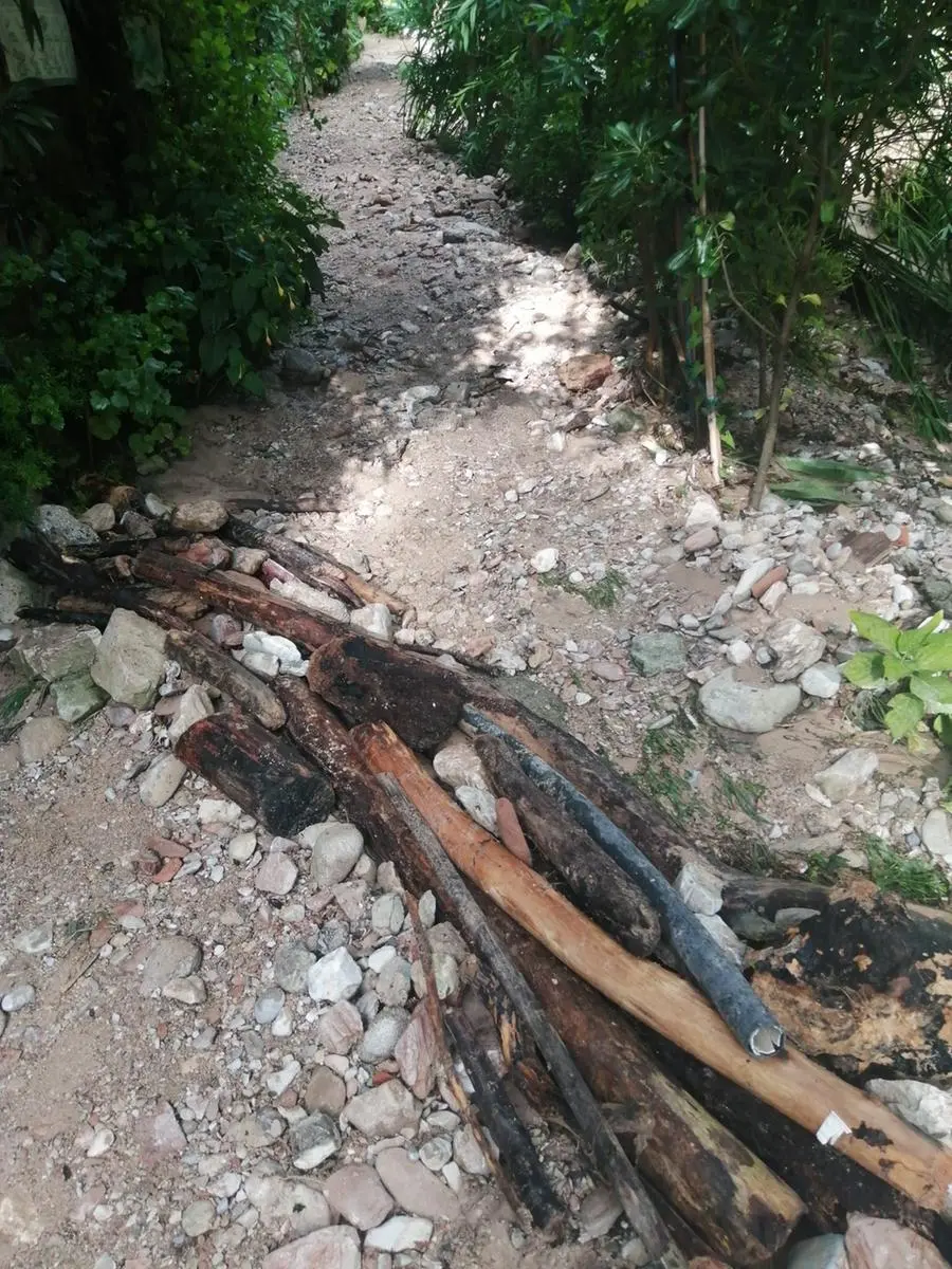 Fango a Villa di Gargnano per l'esondazione del torrente