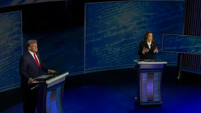 epa11597525 Republican presidential candidate Donald J. Trump (L) and Democratic presidential candidate US Vice President Kamala Harris during a presidential debate hosted by ABC News at the National Constitution Center in Philadelphia, Pennsylvania, USA, 10 September 2024. The 90 minute event is the only planned debate between the two candidates in the 2024 presidential election. EPA/DEMETRIUS FREEMAN / POOL