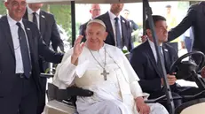 epa11598412 A handout photo made available by Singaporeâ€™s Ministry of Digital Development and Information (MDDI) shows Pope Francis (C) waving as he is welcomed by Catholic faithfuls at Changi Jurassic Mile in Singapore, 11 September 2024. Pope Francis is visiting Singapore from 11 to 13 September, marking the final stop of his apostolic journey through the Asia-Pacific region, which also includes Indonesia, Papua New Guinea, and East Timor. EPA/Ministry of Digital Development and Information (MDDI) / HANDOUT ONE TIME USE ONLYHANDOUT EDITORIAL USE ONLY/NO SALES