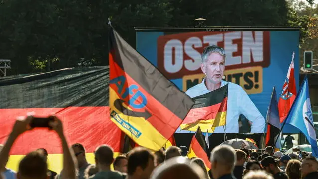 epa11575539 Bjoern Hoecke (on large screen), far-right Alternative for Germany (AfD) party faction chairman in the regional parliament of Thuringia and top candidate for the upcoming 2024 Thuringia state election speaks during the final election campaign rally in Erfurt, Germany, 31 August 2024. Thuringia state election, voting for the regional parliament 'Landtag', will be held on 01 September 2024. EPA/CLEMENS BILAN