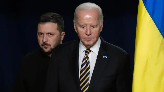 epa11025624 US President Joe Biden (R) and Ukrainian President Volodymyr Zelensky (L) enter the room to hold a joint news conference in the Indian Treaty Room of the Eisenhower Executive Office Building, on the White House complex in Washington, DC, USA, 12 December 2023. Ukrainian President Zelensky is in Washington to meet with members of Congress at the US Capitol and US President Joe Biden at the White House to make a last-ditch effort to convince the US Congress for further military aid before the holiday recess. Republicans want concessions from Democrats on border security in order to support aid to Ukraine. EPA/MICHAEL REYNOLDS