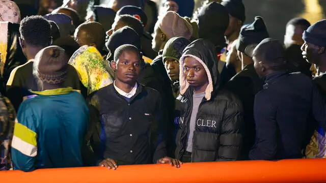 epa11611024 Several migrants arrive on board a Spanish Sea Rescue Unit's ship after Spanish authorities intercepted four boats off Spanish island, in Arrecife, Lanzarote island, southwestern Spain, early 18 September 2024. A total of 200 migrants on board five boats were rescued off Lanzarote island overnight. EPA/Adriel Perdomo