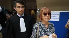 epa11609845 Gisele Pelicot (C), escorted by her lawyer Stephane Babonneau (L) exits under public aplause at the criminal court in Avignon, southern France, 17 September 2024, where her ex-husband stands trial. Dominique Pelicot is accused of drugging and raping his then-wife Gisele Pelicot while she was unconscious. He is also charged with offering her to dozens of men at their home in Mazan, France between 2011 and 2020. Fifty other men are facing trial for their alleged involvement. Pelicot could face a maximum sentence of 20 years in prison if convicted. The trial resumed on 17 September after a delay due to Dominique Pelicot's health concerns. EPA/GUILLAUME HORCAJUELO