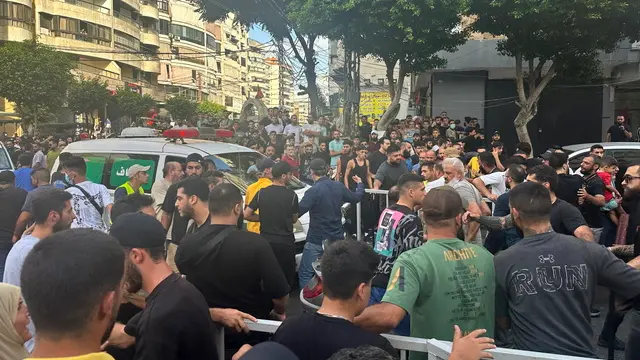 epa11615800 Ambulances carry injured people after a targeted Israeli strike in Beirut, Lebanon, 20 September 2024. The Israeli Defense Forces (IDF) on 20 September released a statement saying it "conducted a targeted strike in Beirut". EPA/WAEL HAMZEH