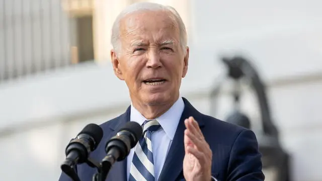 epa11595345 US President Joe Biden delivers remarks during an event to celebrate The Americans with Disabilities Act (ADA) and to mark Disability Pride Month on the South Lawn of the White House in Washington, DC, USA, 09 September 2024. EPA/CHRIS KLEPONIS / POOL