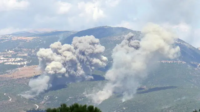 epa11617466 Smoke billows from the site of an Israeli airstrike that targeted southern Lebanese area, as seen fron Marjaayoun, southern Lebanon, 21 September 2024. The Israeli Defense Forces (IDF) said on 21 September they are 'striking targets belonging to the Hezbollah' in Lebanon. The strikes came one day after at least thirty-one people, including Hezbollah commander Ibrahim Akil, were killed and dozens injured in an attack which targeted the southern suburb of Beirut on 20 September, according to the Lebanese Ministry of Health. EPA/STR