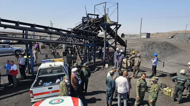 epa11618515 A handout photo made available by the Iranian Red Crescent Society (IRCS) shows Iranian rescue and security forces gathered around a coal mine in Tabas, Khorasan province in southeastern Iran, 22 September 2024. Iranian state media, citing the governor of South Khorasan province, reported that a methane leak at a coal mine in Tabas, eastern Iran, caused an explosion that resulted in at least 30 workers dying, 17 injured, and others missing. EPA/IRANIAN RED CRESCENT SOCIETY / HANDOUT HANDOUT EDITORIAL USE ONLY/NO SALES