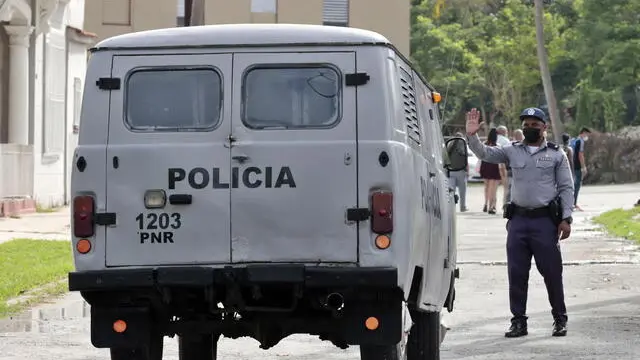 epa09986587 A police van arrives to the court where the trial against Cuban artists and dissidents, Luis Manuel Otero Alcantara and Maiykel Castillo, 'El Osorbo', will take place in Havana, Cuba, 30 May 2022. The trial against Cuban artists and dissidents Luis Manuel Otero Alcantara and Maiykel Castillo, 'El Osorbo', began this morning amid strong security measures in Havana. Otero Alcantara and Castillo, for whom the prosecution is asking for 7 and 10 years in prison, respectively, have been in provisional prison since last year. Otero Alcantara is accused of alleged crimes of insulting the countryâ€™s symbols, contempt and public disorder while Castillo is responsible, according to the Prosecutorâ€™s Office, for the alleged crimes of contempt, 'defamation of institutions and organizations and of heroes and martyrs', attack and public disorder. The human rights NGOs Human Rights Watch (HRW) and Amnesty International (AI) have demanded that they be released 'immediately and unconditionally'. EPA/ERNESTO MASTRASCUSA