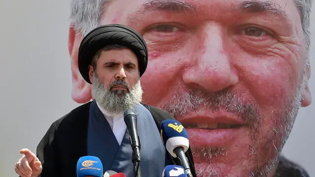 epa11405852 Head of Hezbollah's Executive Council Sayyed Hashem Safieddine, speaks during the funeral of late Hezbollah senior commander Taleb Sami Abdallah mourns during his funeral procession in Beirut, Lebanon, 12 June 2024. According to the Hezbollah media office, four Hezbollah fighters, including the senior leader Taleb Sami Abdallah, were killed after the Israeli attack on a residential building in Jwaya town in the Tyre district, southern Lebanon on 11 June. EPA/WAEL HAMZEH