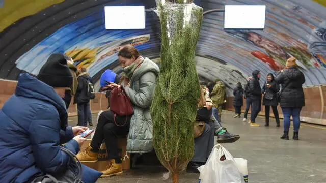 epa10383744 Residents take shelter inside a metro station during an air raid alert in Kyiv (Kiev), Ukraine, 31 December 2022. Russian missiles targeted major cities across Ukraine on 31 December prior to the New Year celebration. Kyiv Mayor Vitaliy Klitschko reported explosions and destruction in three districts of the capital. At least one person was killed, Klitschko said. Russian troops entered Ukraine on 24 February 2022 starting a conflict that has provoked destruction and a humanitarian crisis. EPA/OLEG PETRASYUK