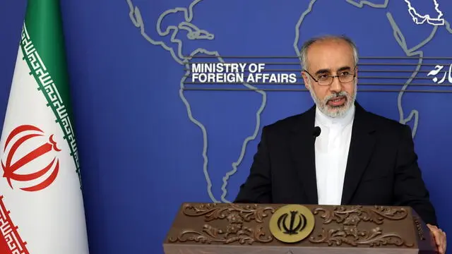 epa10068244 Iran's newly-appointed Foreign Ministry spokesman Nasser Kanani speaks during his first press conference in Tehran, Iran, 13 July 2022. According to Iranian foreign ministry, Kanani said that the nuclear talks are under way and the time and place for the next round will be announce soon. EPA/AREF TAHERKENAREH
