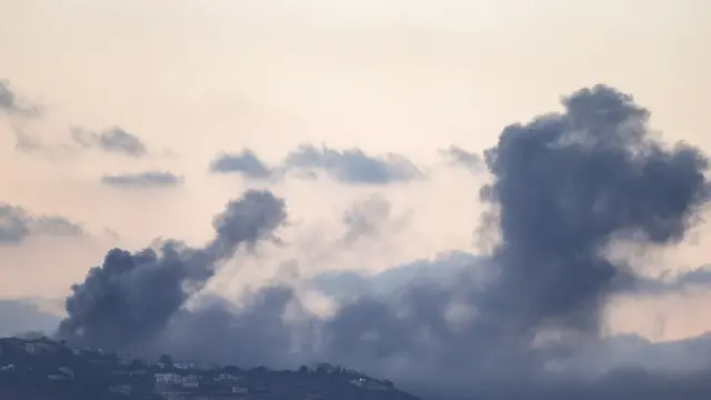 epa11634074 Smoke rises as a result of an Israeli airstrike near Al Khiam in southern Lebanon, as seen from the Israeli side of the border, northern Israel, 30 September 2024. The Israeli military announced on 30 September that it had 'eliminated' the head of the Lebanon Branch of Hamas during an overnight 'IDF and ISA intelligence-based operation' in Lebanon. The Israel Defense Forces (IDF) said they 'will continue to strike, harm, and degrade' Hezbollah's military in Lebanon. EPA/ATEF SAFADI
