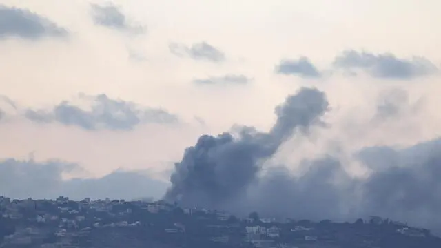 epa11634072 Smoke rises as a result of an Israeli airstrike near Al Khiam in southern Lebanon, as seen from the Israeli side of the border, northern Israel, 30 September 2024. The Israeli military announced on 30 September that it had 'eliminated' the head of the Lebanon Branch of Hamas during an overnight 'IDF and ISA intelligence-based operation' in Lebanon. The Israel Defense Forces (IDF) said they 'will continue to strike, harm, and degrade' Hezbollah's military in Lebanon. EPA/ATEF SAFADI