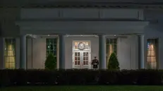 epa11277474 A Marine is posted outside the West Wing entrance of the White House, indicating that President Biden is present, in Washington, DC, USA, 13 April 2024. President Biden has returned to Washington a day early to consult with his national security team in the Situation Room after both Iran and Israel announced that Iran had launched drones and rockets towards Israel. EPA/SHAWN THEW