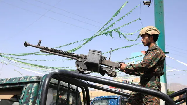 epa11629037 A Houthi soldier mans a machine gun on a vehicle while on patrol during a protest in solidarity with the Lebanese and Palestinian people in Sana'a, Yemen, 27 September 2024. Yemen's Houthis have claimed to have fired 23 ballistic and winged missiles and a drone at three US destroyers in the Red Sea, alleging that they were on their way to support Israel, in the context of the armed conflict between Israel and the Palestinian and Lebanese groups of Hamas and Hezbollah, according to a statement by Houthi military spokesman Yahya Sarea. This Houthi attack came a few hours after the Israeli military said they intercepted a surface-to-surface missile outside of Israeli territory that was launched from Yemen. EPA/YAHYA ARHAB