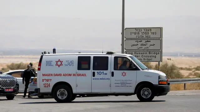 epa11593043 A medical service van rides near the site after a truck driver opened fire at Allenby Bridge, also known as the King Hussein Bridge, crossing between Jordan and the West Bank, near Jericho, West Bank, 08 September 2024. Three Israelis were killed in a shooting attack at the border crossing, the Israeli army said in a post on social media. The driver approached the area of the Allenby Bridge from Jordan in a truck, exited the truck, and opened fire at the Israeli security forces operating at the bridge, the Israeli Defence Forces (IDF) reported. EPA/Jamal Awwad