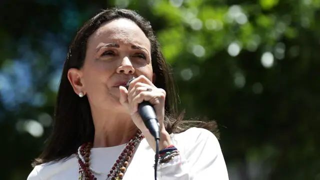 epa11569660 Venezuelan opposition leader Maria Corina Machado gives a speech to supporters at a rally in Caracas, Venezuela, 28 August 2024. Machado said that 'not a single democratic government in the world has recognized' the re-election of Nicolas Maduro, whose victory in the July 28 presidential election she considers a 'fraud', as does a large part of the international community. EPA/RONALD PENA