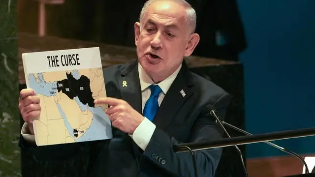 epa11628869 Prime Minister of Israel Benjamin Netanyahu shows a map as he addresses the General Debate of the 79th session of the United Nations General Assembly at United Nations Headquarters in New York, New York, USA, 27 September 2024. The annual high-level General Debate gathers world leaders from 24 to 28 September, and 30 September under the theme, 'Leaving no one behind: acting together for the advancement of peace, sustainable development and human dignity for present and future generations'. EPA/STEPHANI SPINDEL