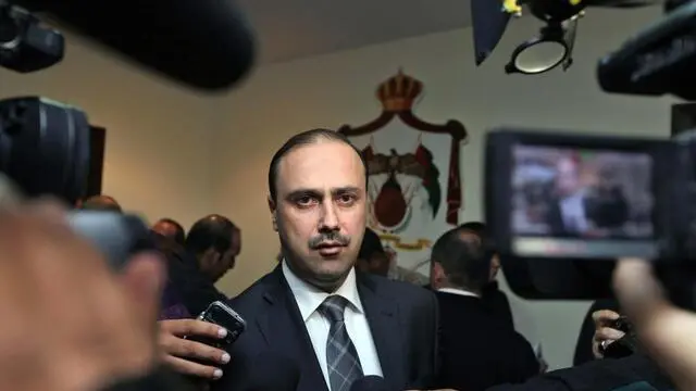 epa05024910 State Minister for Media Affairs and the Government spokesman, Mohammad Momani, gives a statement to a reporters, in Amman, Jordan, 14 November 2015. Jordan strongly condemned the terrorist attacks in the French capital Paris that killed at least 140 people and injured scores of others, also reiterating Jordan's stance against terrorist organizations that target people and property without taking into account the sanctity of religion, human values and ethics. The minister also offered the Government's condolences to the French Government, people and the families of the victims, and wished the injured a speedy recovery. EPA/JAMAL NASRALLAH