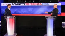 epa11636941 Republican vice presidential nominee JD Vance (L), and Minnesota Governor and Democratic vice presidential nominee Tim Walz (R) prepare to shake hands before the start of the Vice Presidential debate at the CBS Broadcast Center in New York, New York, USA, 01 October 2024. EPA/SARAH YENESEL