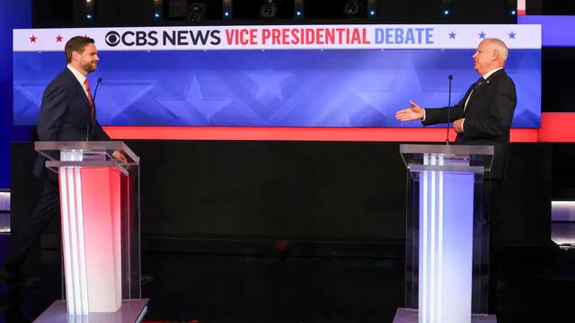 epa11636941 Republican vice presidential nominee JD Vance (L), and Minnesota Governor and Democratic vice presidential nominee Tim Walz (R) prepare to shake hands before the start of the Vice Presidential debate at the CBS Broadcast Center in New York, New York, USA, 01 October 2024. EPA/SARAH YENESEL