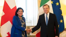 Italy's Prime Minister, Mario Draghi (R) greets Georgia's President Salome Zourabichvili on June 7, 2022 upon her arrival for their meeting at Palazzo Chigi in Rome. ANSA/PRESS OFFICE CHIGI'S PALACE/FILIPPO ATTILI +++ NO SALES, EDITORIAL USE ONLY+++