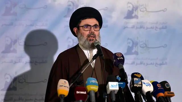 epa09680676 Head of the Hezbollah Executive Council, Sayyed Hashem Safieddine delivers remarks on the execution of Sheikh Nimr Al Nim, outside Beirut, Lebanon, 12 January 2022. Members of Hezbollah marked the sixth anniversary of the execution of prominent Shiite cleric Sheikh Nimr, who was sentenced to death and executed in Riyadh on 02 January 2016. EPA/WAEL HAMZEH