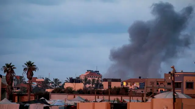 epa11644096 Smoke rises following Israeli air strikes in the northern Al Nusairat refugee camp, central Gaza Strip, 05 October 2024. More than 41,500 Palestinians and over 1,400 Israelis have been killed, according to the Palestinian Health Ministry and the Israel Defense Forces (IDF), since Hamas militants launched an attack against Israel from the Gaza Strip on 07 October 2023, and the Israeli operations in Gaza and the West Bank which followed it. EPA/MOHAMMED SABER