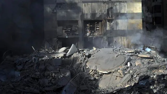 epa11641204 Smoke rises from damaged buildings following an Israeli airstrike in Al Mreijeh, in the southern suburbs of Beirut, Lebanon, 04 October 2024. According to Lebanon's National News Agency (NNA), Israeli raids targeted Beirut's southern suburbs overnight, hitting areas near Mreijeh, Hadi Nasrallah Highway and Hadath, and resulting in the collapse of several buildings and facilities. Lebanese Minister of Health, Firas Abiad, announced on 03 October, that 1,974 people have been killed, including 127 children and 261 women, and 9,384 others have been injured in Lebanon since the beginning of the Hezbollah-Israeli conflict. EPA/WAEL HAMZEH