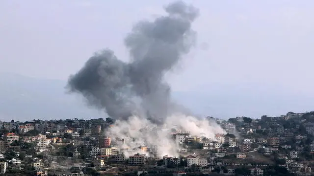 epaselect epa11647541 Smoke rises following an Israeli airstrike in the village of Khiam, as seen from Marjaayoun, close to the border with Israel, in southernÂ Lebanon, 07 October 2024. According to the Lebanese Minister of Health, more than 2,000 people have been killed and more than 9,600 others have been injured in Lebanon since the beginning of the Israeli-Hezbollah conflict. Israel's military stated on 07 October, that the Israeli Air Force (IAF) has conducted 'extensive strikes' on Hezbollah targets in southern Lebanon. EPA/STRINGER