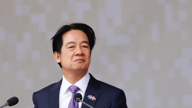 epa11651696 Taiwan President William Lai speaks during the Taiwan National Day celebration in front of the Presidential Office in Taipei, Taiwan, 10 October 2024. In his first National Day speech since assuming office in May, President William Lai stated that the People's Republic of China 'has no right to represent Taiwan.' EPA/RITCHIE B. TONGO