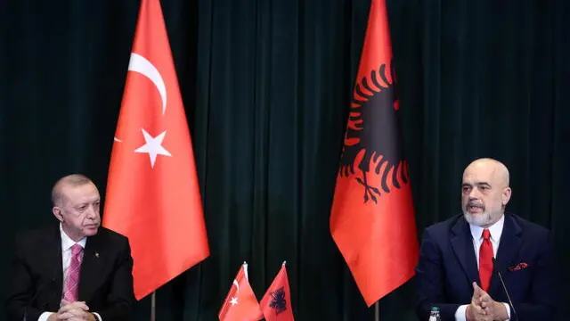 epa09691636 Turkish President Recep Tayyip Erdogan (L) during a press conference with Albanian Prime Minister Edi Rama (R) in Tirana, Albania, 17 January 2022. Turkish President Recep Tayyip Erdogan is making an official visit to Albania to strengthen the bilateral relationships between the two countries and sign some agreements in the economic field. EPA/Malton DIBRA